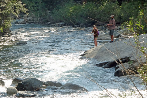 two people fishing in the San Joaquin River, CA
